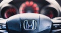 Stirling, Scotland - 17 August 2020: Honda cars logo on a steering wheel