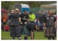 Strongmen prepare to take part in the shot putt