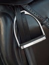 Stirrup at dressage saddle. close up