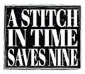 A STITCH IN TIME SAVES NINE, text on black stamp sign Royalty Free Stock Photo