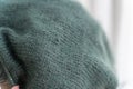 Stitchery green sweater for Christmas, close up Royalty Free Stock Photo