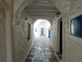 Stoa with shelter and arch over at Chora village, Kithnos island, Greece