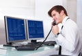 Stock broker working at office Royalty Free Stock Photo