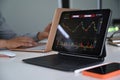 Stock charts on monitor of computer tablet. Royalty Free Stock Photo