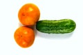 Stock Foto Closeup of yellow orange tomato and cucumber isolated on white background Royalty Free Stock Photo