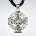 Elegant Silver Celtic Cross Pendant on White Background, Generative AI