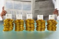 STOCK letter on gold coins stack Royalty Free Stock Photo