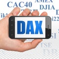 Stock market indexes concept: Hand Holding Smartphone with DAX on display Royalty Free Stock Photo