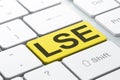 Stock market indexes concept: LSE on computer keyboard background