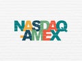 Stock market indexes concept: NASDAQ-AMEX on wall background