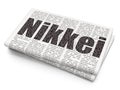 Stock market indexes concept: Nikkei on Newspaper background