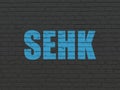 Stock market indexes concept: SEHK on wall background