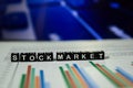 Stock Market on wooden blocks. Finance Exchange Economy Money Concept Royalty Free Stock Photo