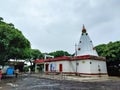 Stock photo of ancient Hindu temple of goddess renukadevi or tembalabai Devi. Temple building painted with white and red color,