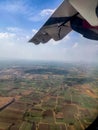 Stock photo of beautiful aerial view seen through window. Skyscape with clouds from the plane window at Bangalore Karnataka India Royalty Free Stock Photo