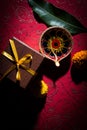 Stock photo of beautiful diwali diya with gift box