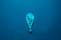 Stock photo of a blue monday balloon on a blue background