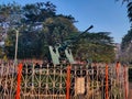 Stock photo of Bofors gun showcasing at Rankala lake garden , green tree and blue sky on background. Picture captured under bright Royalty Free Stock Photo