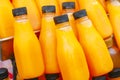 Stock Photo - Bottle of orange juice with ice.