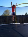 Stock Photo of Boy Jumping at Trampoline Royalty Free Stock Photo