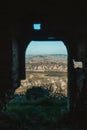 View of Beautiful Southern Italian Mountains through a Crumbling Doorway in the Ruins of Craco