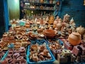 Stock photo of clay made pots, oil lamps, decorative items, animals, lantern, traditional stove idols, kept on street for sale. Royalty Free Stock Photo