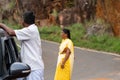 Indian Senior Couple Stranded with Car Breakdown, Awaiting Assistance Royalty Free Stock Photo
