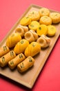 Stock photo of collection of variety of sweets or orange peda or pedha or pera made up of milk, khoya, sugar , saffron etc. select