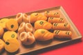 Stock photo of collection of variety of sweets or orange peda or pedha or pera made up of milk, khoya, sugar , saffron etc. select