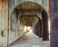 Stock Photo - corridor of concrete pillars with perspective dept