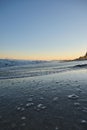 A vertical shot of an empty beach shore at Coast Tarragona, Spain Royalty Free Stock Photo