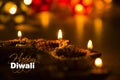 Happy diwali - diwali greeting card with illuminated diya