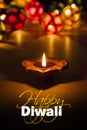 Happy diwali - diwali greeting card with illuminated diya Royalty Free Stock Photo