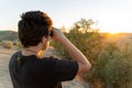 Young Unrecognized Boy Using Binoculars Royalty Free Stock Photo