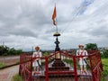 Stock photo of the great Maratha king Chatrapati Shivaji Maharaj statue, two warriors statue installed beside the kings statue,