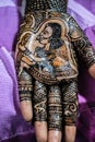 Stock photo of Indian bride hand beautifully decorated by henna tattoo or henna design or mehndi design for wedding at kolhapur Royalty Free Stock Photo