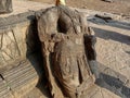 Stock photo of Intricate ruined ancient sculpture of India god or goddess, carved out of gray stone in ancient Hindu temple. Royalty Free Stock Photo