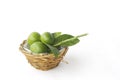 Stock Photo:Lemons in basket isolated on white