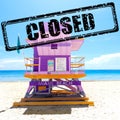 Stock photo of a lifeguard station in Miami Beach and an advertisement with the text closed related to coronavirus disease and