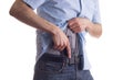 Man drawing concealed carry pistol