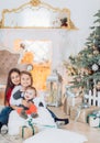 Portrait of three beautiful girls sisters in Christmas decorations Royalty Free Stock Photo