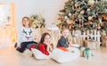 Portrait of three beautiful girls sisters in Christmas decorations Royalty Free Stock Photo