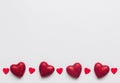 Stock photo of red hearts on a white background with a space for text Royalty Free Stock Photo