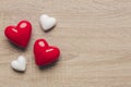 Stock photo of red and white hearts on a wooden background with space for text Royalty Free Stock Photo