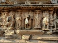 Stock photo of ruined ancient sculpture of Hindu trinity god sitting on elephant, idol carved out off gary color granite sunlight