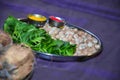 Stock photo of steel plate decorated with auspicious or rituals objects vermilion, betel leafs, betel nuts, turmeric for