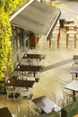 Stock Photo - Sunny patio with table and chairs, high angle view Royalty Free Stock Photo