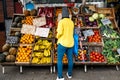 Woman Buying in Street Market Royalty Free Stock Photo