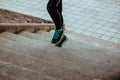 Stock photo of a young woman climbing stairs while running Royalty Free Stock Photo