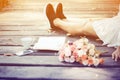 Stock Photo:A young woman sitting outside soft focus vintage st Royalty Free Stock Photo